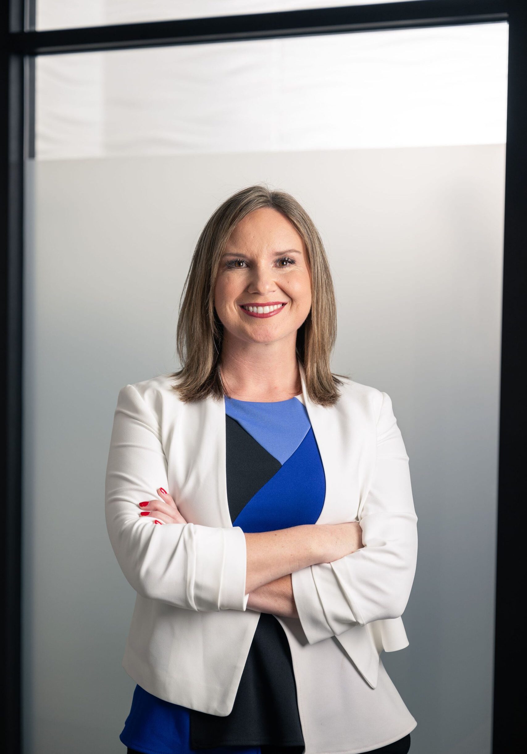 Dr. Lucy Belcher, board-trained periodontist and implant specialist